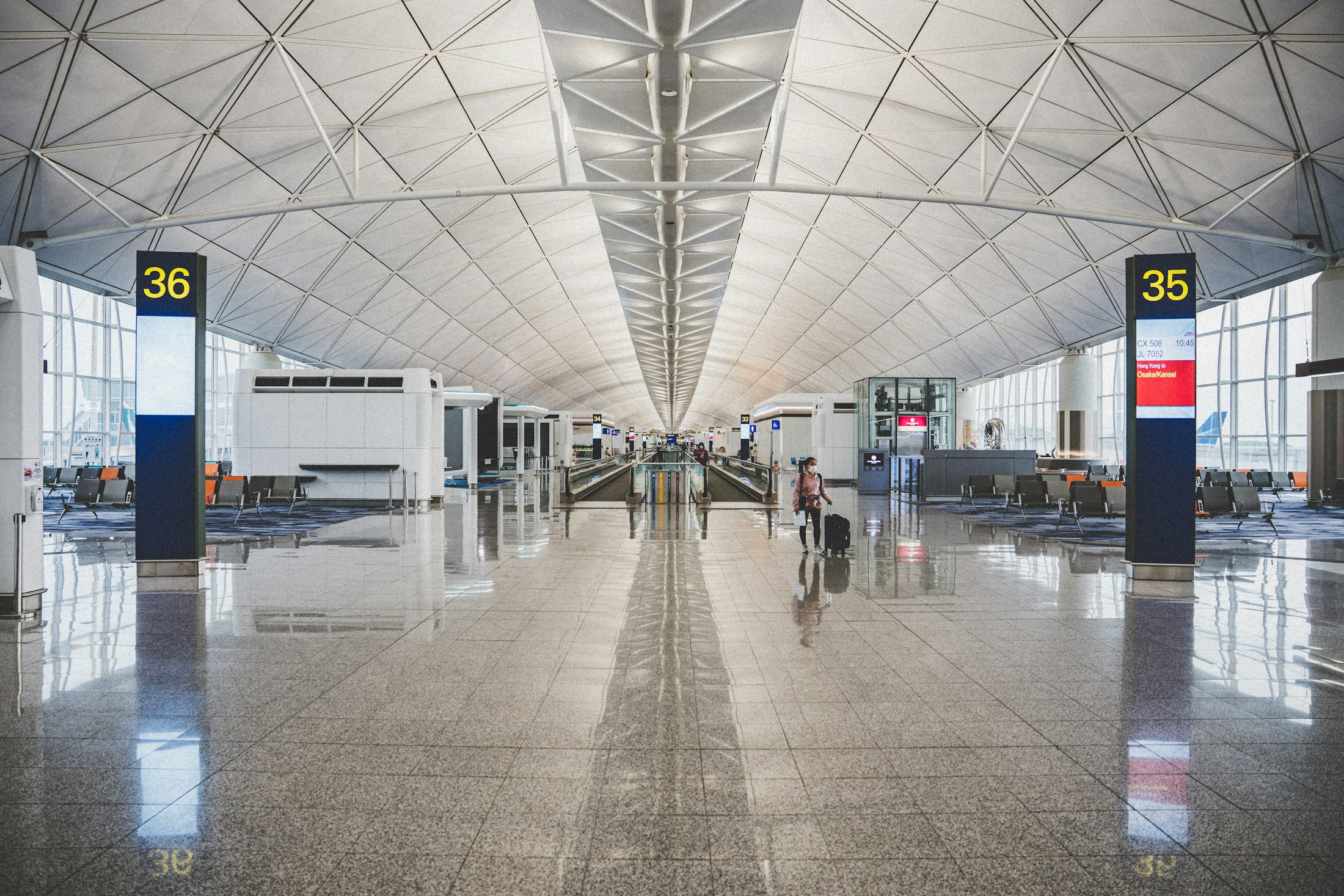 A bright, modern airport terminal hall